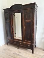 Driedeurs spiegelkast, Ophalen