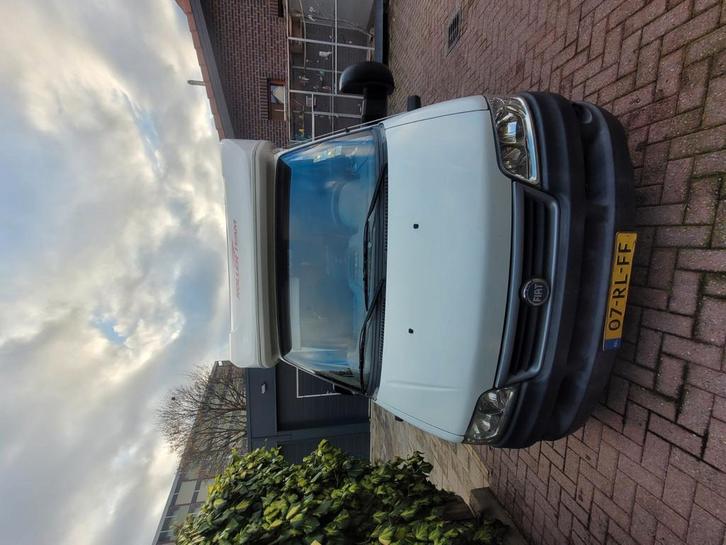 Trigano Autoroller 2.3 JTD Garage P Living 2005 Wit, Caravans en Kamperen, Campers, Diesel, Ophalen