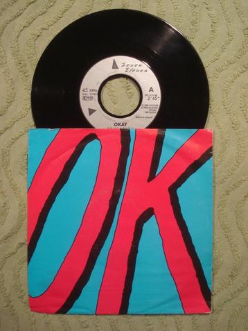Okay 7" Vinyl Single: ‘Education’ (Duitsland)  beschikbaar voor biedingen