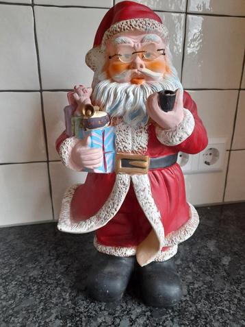 stenen kerstman beschikbaar voor biedingen