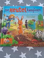 boek marianne busser en ron schroder - de keutelkampioen, Ophalen of Verzenden, Gelezen