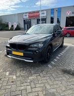 BMW X1 2.0D 110KW Aut. 2011 Zwart, Auto's, Euro 5, Zwart, 4 cilinders, Zwart