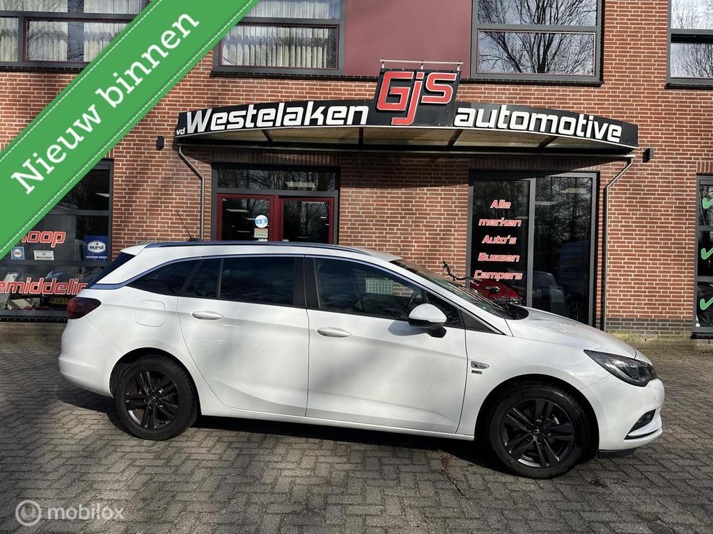 Opel Astra Sports Tourer 1.0 Turbo 120 Jaar Edition, Auto's, Voorwielaandrijving, Gebruikt, Euro 6, 1178 kg