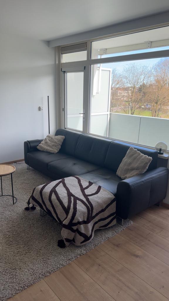 Zwarte hoekbank, Huis en Inrichting, Banken | Bankstellen, 250 tot 300 cm, Hoekbank, Leer, Ophalen of Verzenden