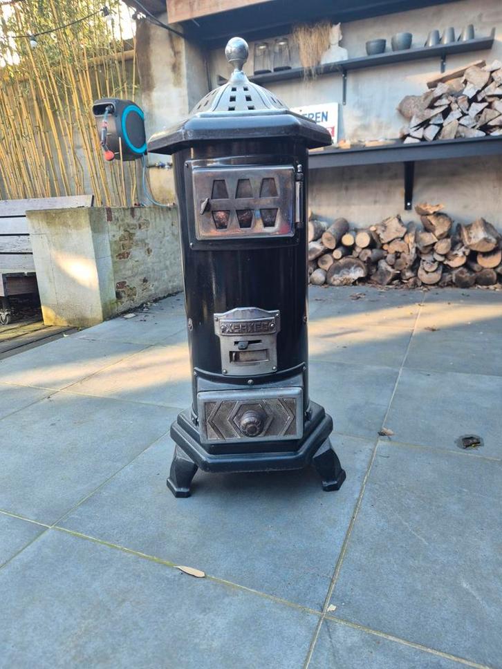 Houtkachel. Zwart geëmailleerd met nikkel accenten, Huis en Inrichting, Kachels, Ophalen of Verzenden