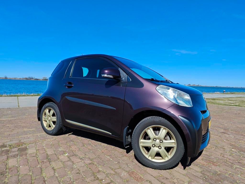 Toyota IQ Aspiration/keyless/navi/bomvol/1JR APK/nwe beurt, Auto's, Toyota, Euro 6, Leder en Stof, 68 pk, Overige kleuren