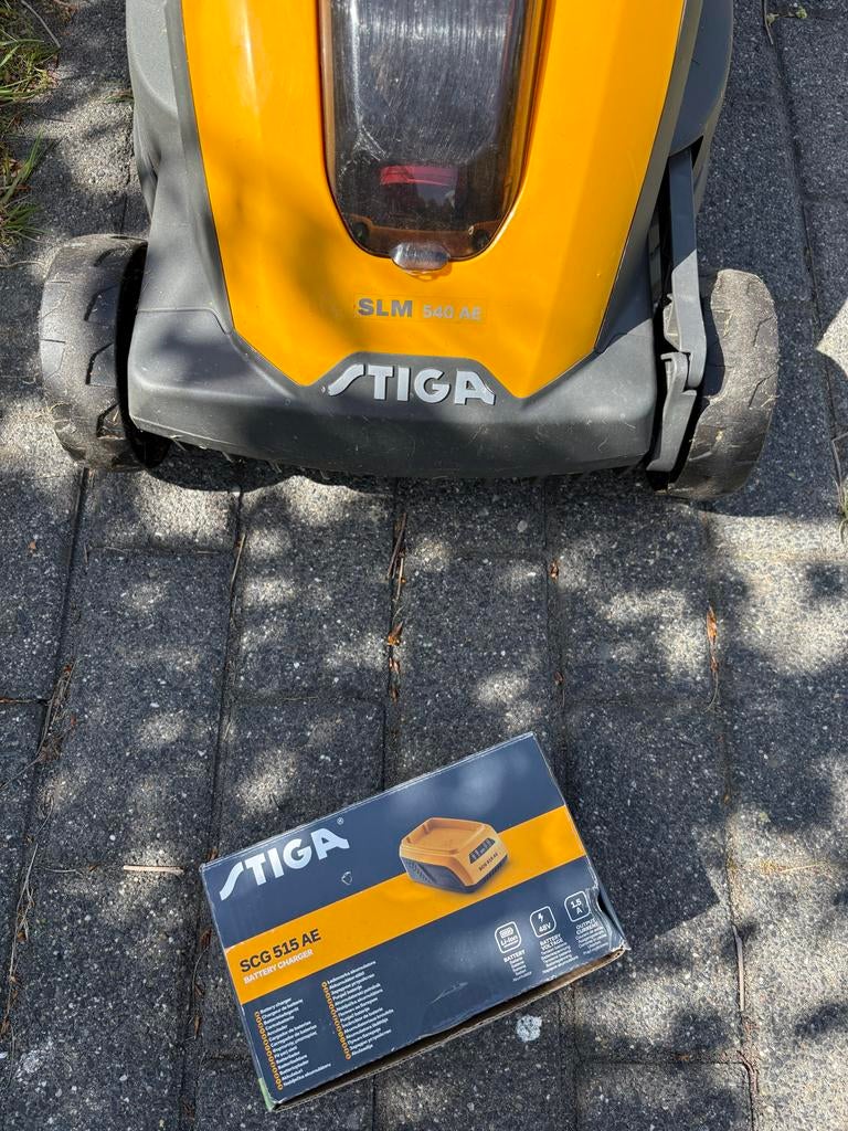 Stiga SLM 540 AE Accu Grasmaaier met Lader, Ophalen, Cirkelmaaier, Gebruikt, Accu-grasmaaier