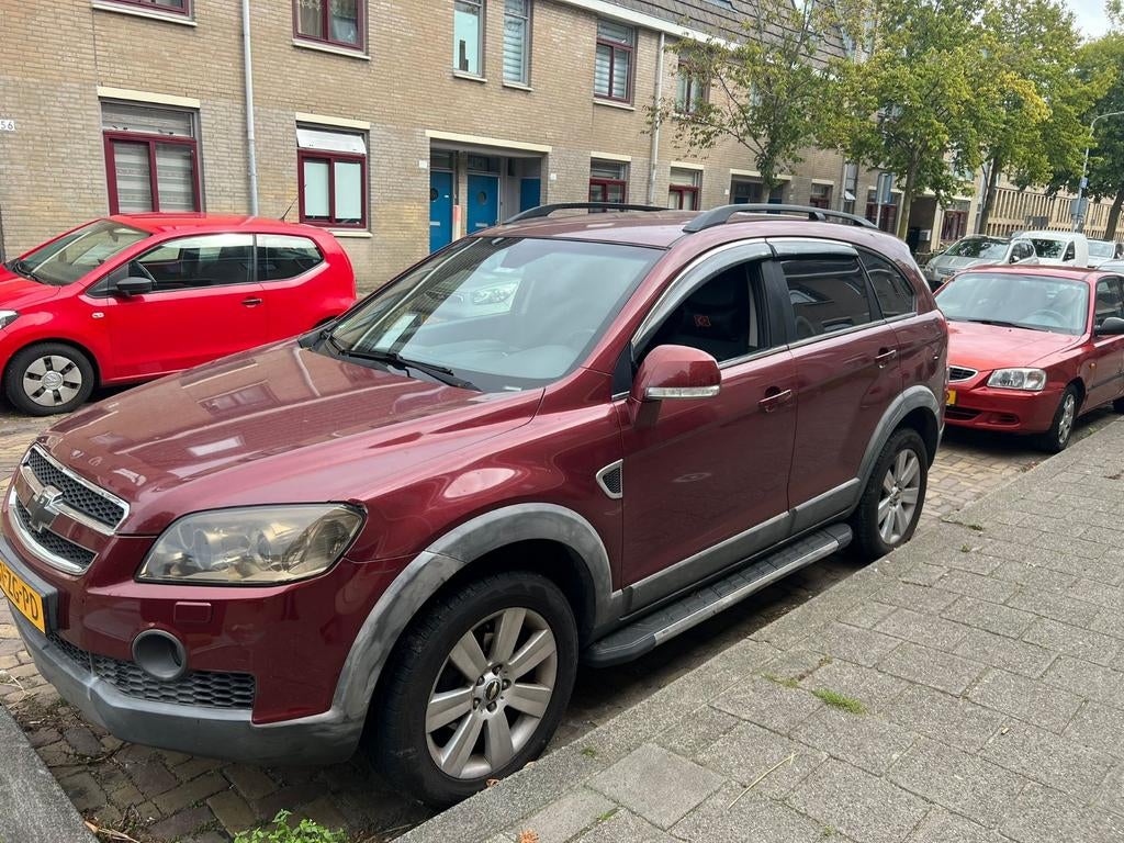 Chevrolet Captiva 3.2 4WD AUT 2008 Rood, Auto's, Automaat, 1780 kg, 3195 cc, Zwart