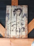 Op hout geprinte engel, Ophalen