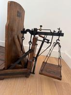 Oude houten weegschaal, Ophalen