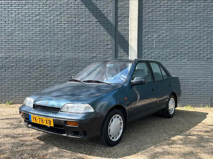 SUZUKI SWIFT/LAGE KM/bj 1990, Auto's, Suzuki, Bedrijf, Benzine, Sedan, Handgeschakeld, Blauw, Grijs, Stof, Ophalen