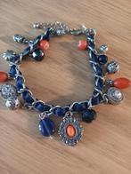 armband met blauw lint en diverse bedels, Ophalen of Verzenden, Zo goed als nieuw, Blauw, Overige materialen