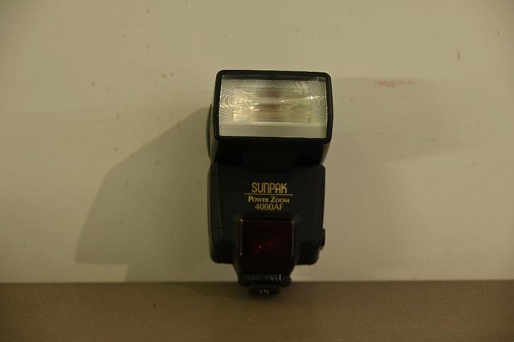 Sunpak powerzoom 4000AF Canon flitser, Audio, Tv en Foto, Fotografie | Flitsers, Gebruikt, Overige merken, Kantelbaar, Ophalen of Verzenden