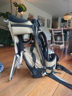 Nomad rugdrager kind, Ophalen