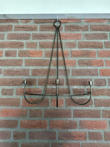 Wand kaarskandelaar beschikbaar voor biedingen