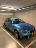 BMW 1-Serie 118i 136pk Aut 2017 Blauw, 65 €/maand, 1295 kg, Blauw, Origineel Nederlands
