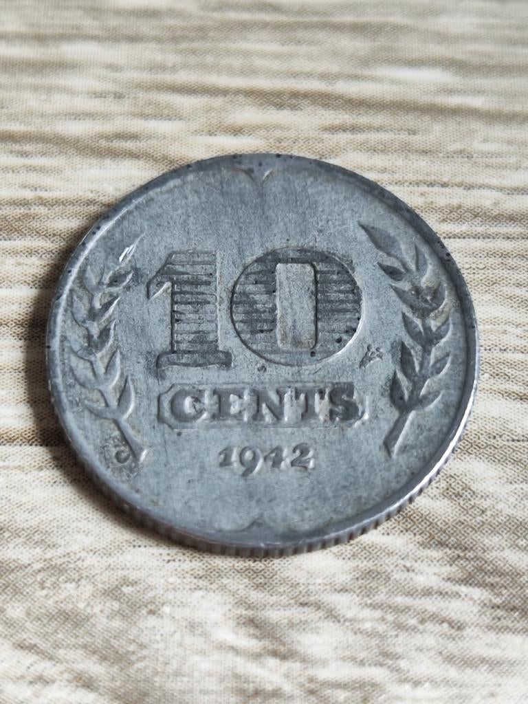 Zinken dubbeltje uit 1942, Nederland, Ophalen