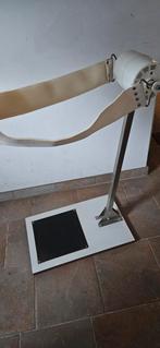 Massage apparaat voor de rug, Ophalen