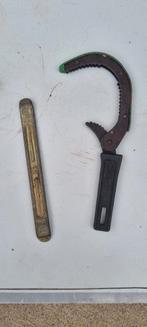 autogereedschap bandenlichter en oliefiltersleutel, Ophalen