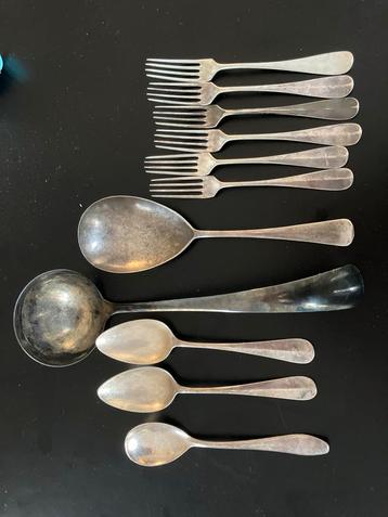 Zilveren bestek Haags lofje en zilveren paplepel. beschikbaar voor biedingen