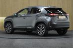 Toyota Yaris Cross 1.5 Hybrid 115 First Edition | Comfort Pa, Stof, Gebruikt, Bedrijf, Hybride Elektrisch/Benzine