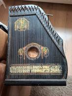 Engel cither met  stemsleutel moet alleen gestemd worden, Ophalen