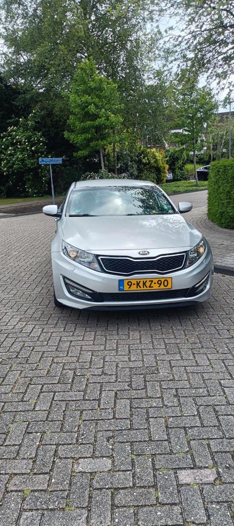 Kia Optima 2.0 CWT Hybrid 110KW 2013 Grijs, Auto's, Kia, Particulier, Optima, Hybride Elektrisch/Benzine, A, Sedan, Automaat, Origineel Nederlands