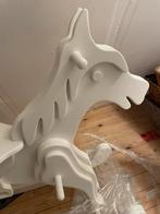 Nieuw degelijk hobbelpaard, Ophalen