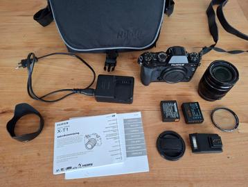 Fujifilm X-T1 + Fujinon XF 18-55mm lens + accessoires beschikbaar voor biedingen