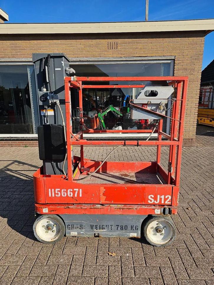 Skyjack Sj12 mast hoogwerker met boek schaarlift (bj 2015), Zakelijke goederen, Machines en Bouw | Liften, Steigers en Ladders