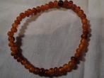 met amberkl kralen nr arm 1029, Sieraden, Tassen en Uiterlijk, Ophalen of Verzenden, Nieuw, Overige kleuren, Kunststof of Plastic