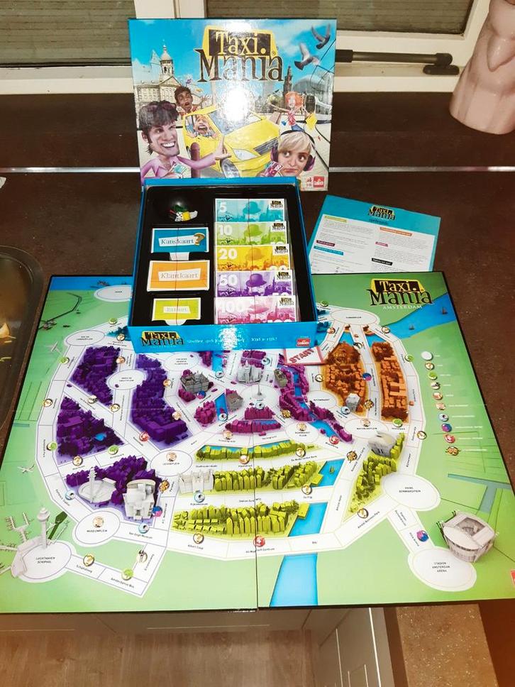 Taxi mania Goliath, Hobby en Vrije tijd, Gezelschapsspellen | Bordspellen, Zo goed als nieuw, Ophalen of Verzenden