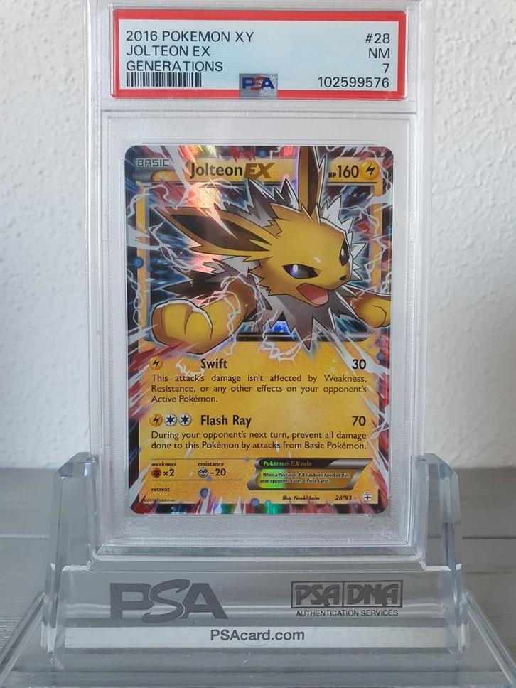 Jolteon EX Generations PSA 7 XY 2016 #28 Pokemon kaart Holo, Hobby en Vrije tijd, Verzamelkaartspellen | Pokémon, Nieuw, Ophalen of Verzenden