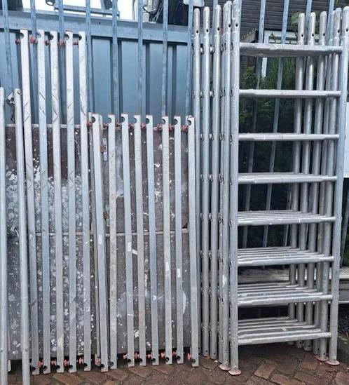 Te koop aluminium klus steiger werkhoogte 7. Meter, Doe-het-zelf en Verbouw, Steigers, Gebruikt, Rolsteiger of Kamersteiger, 5 meter of hoger