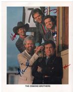 Gesigneerde foto the Osmonds, Verzamelen, Muziek, Artiesten en Beroemdheden, Ophalen of Verzenden, Zo goed als nieuw, Foto of Kaart