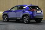 Toyota Yaris Cross 1.5 Hybrid 115 First Edition | Adaptive-c, Stof, Gebruikt, Blauw, Bedrijf