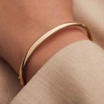 Gouden bangle armband van Isabel bernard. Nieuw, Nieuw, Goud, Goud, Ophalen of Verzenden