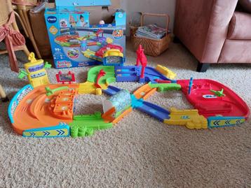 Vtech racebaan en garage beschikbaar voor biedingen