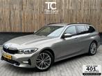 BMW 3-serie Touring 330e Automaat | Leer | Adaptieve cruise, Achterwielaandrijving, Gebruikt, Euro 6, 4 cilinders