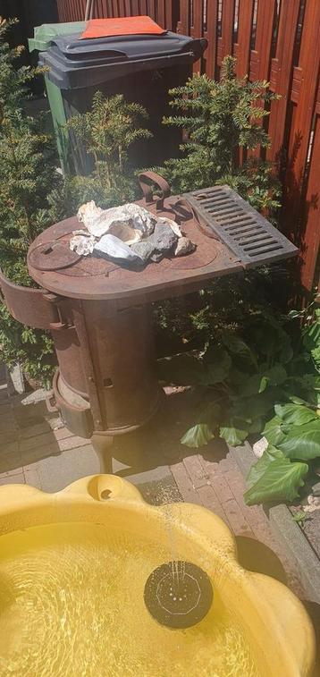Hele mooie vitage  potkachel beschikbaar voor biedingen
