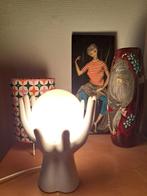 Hands of hope lamp, Ophalen