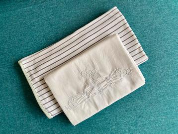 Baby wikkeldoek en lakentje beschikbaar voor biedingen