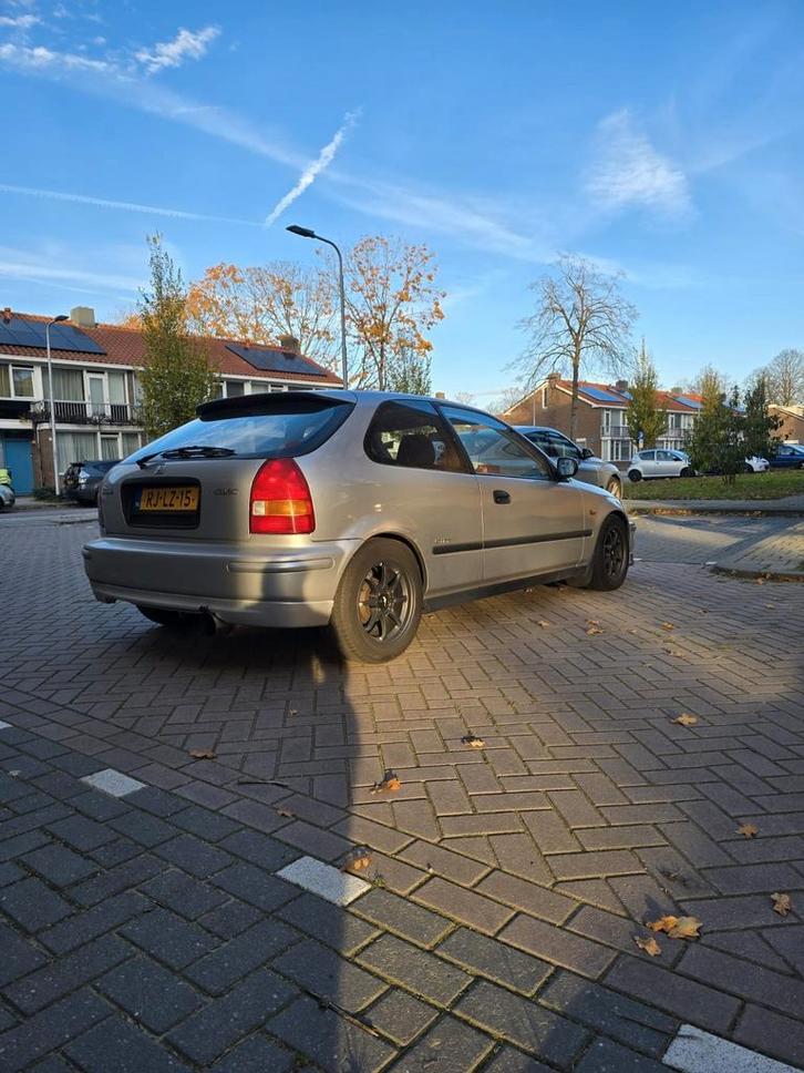 Honda Civic 1.4 i S 1997 Grijs, Auto's, Honda, Particulier, Civic, Airconditioning, Bluetooth, Mistlampen, Open dak, Radio, USB