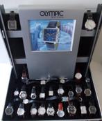 27 Olympic horloges in aluminium koffer (nieuw ongedragen), Overige merken, Leer, Polshorloge, Nieuw