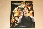 Hunger Games Catching Fire - Het officiële boek bij de film, Verzamelen, Overige typen, Ophalen of Verzenden, Zo goed als nieuw