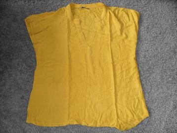 In prima staat: okergeel damesshirt, korte mouw, Hema, M beschikbaar voor biedingen