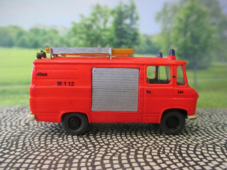 Mercedes T2 L 406 Metz Feuerwehr  pomp- materiaalwagen, Hobby en Vrije tijd, Modelauto's | 1:87, Gebruikt, Auto, Wiking, Ophalen of Verzenden