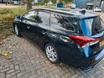 Toyota Auris 1.8 Hybrid Touring Sports CVT 2015 Grijs, Auto's, 65 €/maand, 28 km/l, Origineel Nederlands, Te koop
