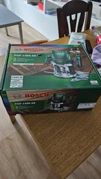 Bosch POF 1200 AE Bovenfrees + 15-delige Frezenset, Doe-het-zelf en Verbouw, Ophalen, Zo goed als nieuw, Elektrisch, Bovenfrees