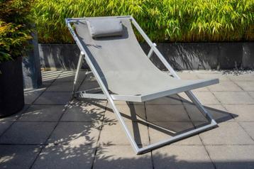 2 Ligstoelen/Strandstoelen/Deckchairs (metalen uitvoering) beschikbaar voor biedingen